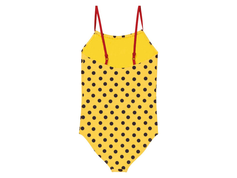 Gelber Badeanzug mit schwarzen Punkten.