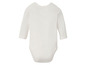 Ein weißer Babybody mit langen Ärmeln.