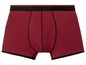 Rote Boxershorts mit schwarzem Gummizug.