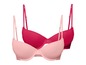 Zwei BHs, einer rosa und einer rot.
