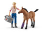 Spielfiguren: Eine Frau mit einem Erste-Hilfe-Kasten und ein Fohlen mit einem Verband.