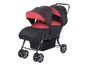 Ein schwarzer Doppelkinderwagen mit roter Polsterung.