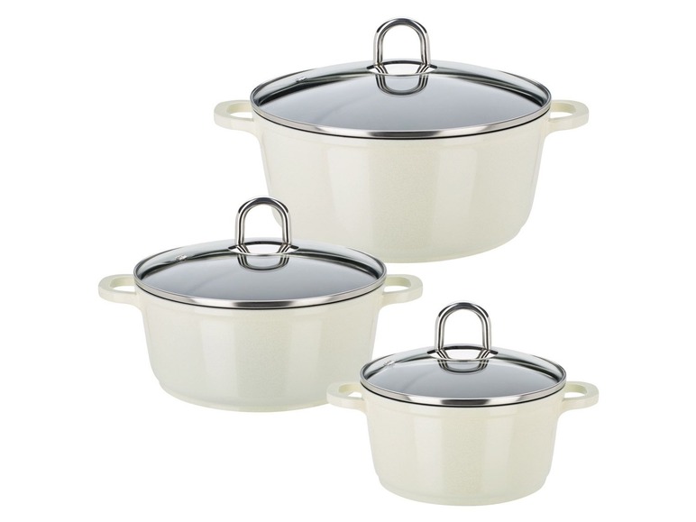 Ein Set aus drei weißen Töpfen mit Glasdeckeln.