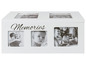 Eine weiße Fotobox mit der Aufschrift 'Memories' und Familienfotos.