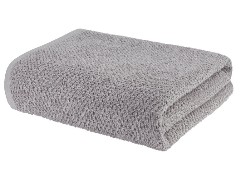 Ein gefaltetes graues Handtuch.