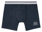 Dunkelblaue Boxershorts mit weißem Band und dem Logo 'Original Heritage since 1973'.