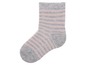 Ein graues Socken mit rosa Streifen.