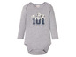Ein graues Baby-Bodysuit mit langen Ärmeln und einem 101 Dalmatiner Motiv.