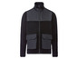 Eine schwarze Fleecejacke mit Reißverschluss und Taschen.