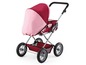 Ein rosa und roter Kinderwagen mit einer Babywanne und einem Einkaufskorb.
