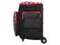 Ein schwarzer Rollkoffer mit weißen Punkten und roten Akzenten.