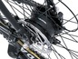 Nahaufnahme des Hinterradnaben eines E-Bikes mit Blaupunkt-Motor und Scheibenbremse.