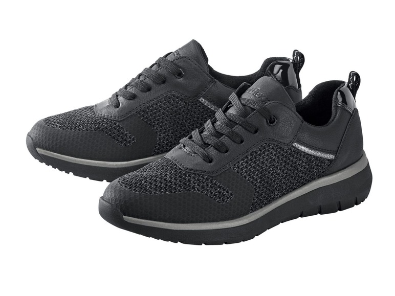 Schwarze Sneaker mit Mesh-Details.