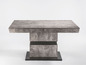 Ein grauer Esstisch im Beton-Look.