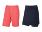 Eine rosa Shorts und ein dunkelblauer Rock mit integrierter Short.