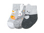 Drei Paar Babysocken mit Motiven von Kaninchen, Katze und Vogel.