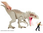 Eine weiße Indominus Rex Dinosaurier Spielfigur mit einer kleineren Figur eines Mannes.