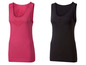 Zwei nahtlose Sport-Tops, eines rosa und eines schwarz.