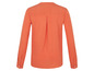 Eine orangefarbene Bluse mit langen Ärmeln.