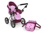 Ein rosa Kinderwagen mit Sternenmuster für Puppen.