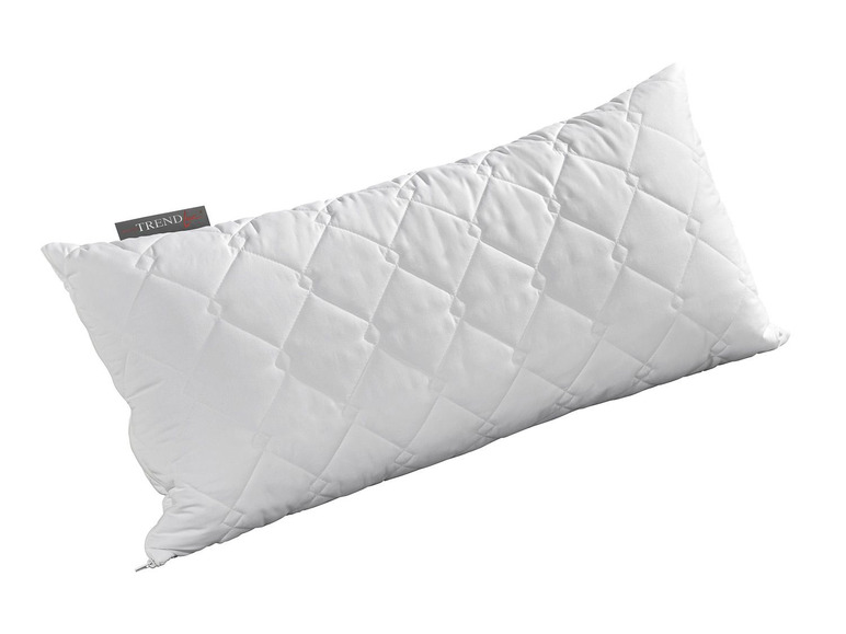 Ein weißes, gestepptes Kissen von Trendline.