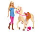 Barbie Puppe mit Pferd, Sattel und Helm.