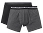 Zwei Paar Boxershorts, eine schwarze und eine graue, mit 'Casualwear'-Band.