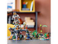 LEGO Ninjago Set mit einem Tempel, einem Drachen und Minifiguren.