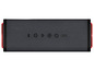Ein schwarzer tragbarer Bluetooth-Lautsprecher mit roten Akzenten.