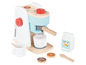 Ein hölzernes Spielzeug-Kaffeemaschine mit Tassen, Milch und Kaffeebohnen.