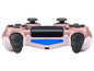 Ein roségoldener Sony PlayStation 4 Controller.