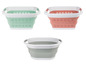 Drei faltbare Wäschekörbe in Mint, Rosa und Grau.