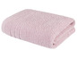Ein rosa Handtuch, gefaltet.