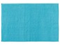 Eine türkisfarbene Badematte mit geriffelter Oberfläche.