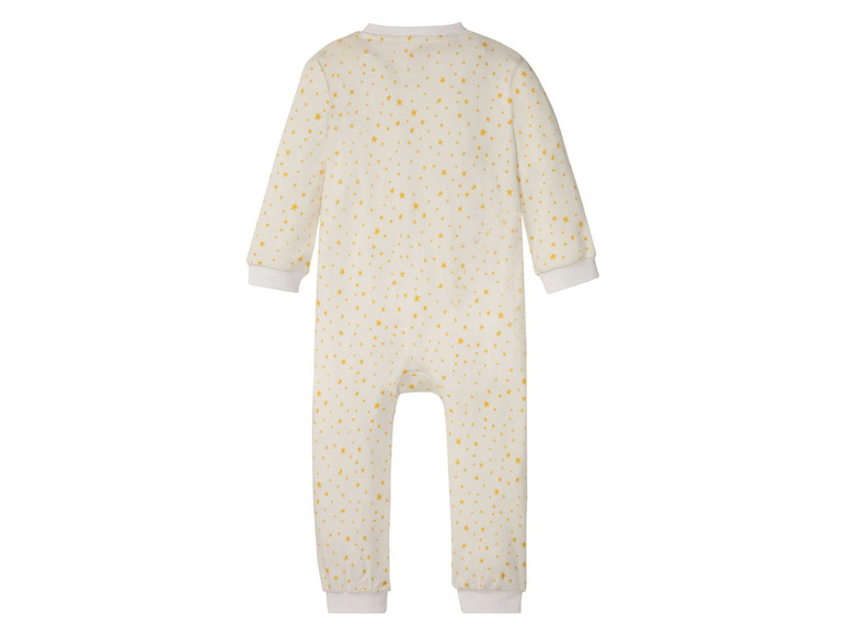 Ein weißer Baby-Schlafsack mit gelben Sternen