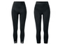 Zwei schwarze Leggings mit Spitze am unteren Rand.