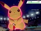Pikachu in einem Pokémon-Kampf mit einem Trainer in der Arena.