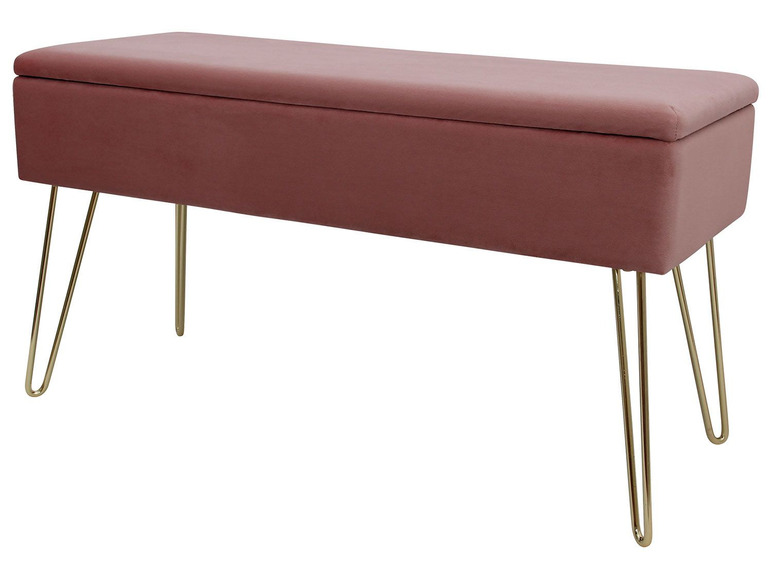 Eine rosa Samtbank mit goldenen Beinen