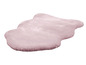 Ein rosa, flauschiger Teppich in unregelmäßiger Form.
