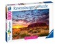 Ravensburger Puzzle mit 1000 Teilen, das einen Sonnenuntergang über Uluru zeigt.