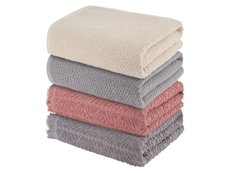 Ein Stapel Handtücher in verschiedenen Farben.