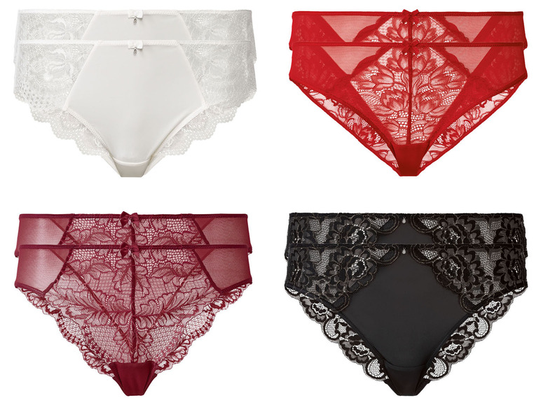 Vier Paar Damen-Slips mit Spitze, darunter ein weißer, zwei rote und ein schwarzer.