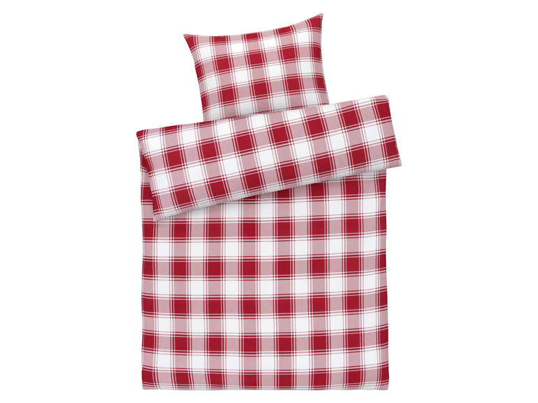 Rote und weiße karierte Bettwäsche.