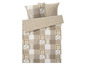 Beige Bettwäsche mit Patchwork-Muster und passenden Kissenbezügen.