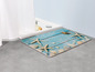 Badematte mit Muscheln und Seesternen im Strand-Design.