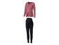 Eine rosafarbene Umstands-Bluse und schwarze Leggings.