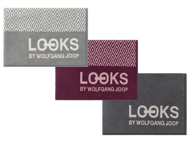 Drei Handtücher von Wolfgang Joop mit geometrischem Muster.