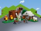 LEGO Minecraft Figuren, darunter ein Iron Golem und ein Schaf.