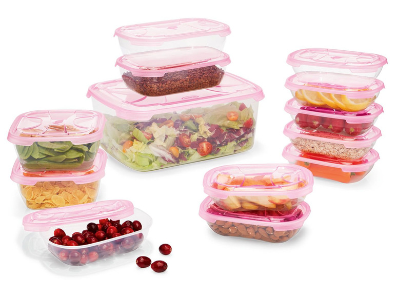 Ein Set rosa Plastik-Lebensmittelbehälter gefüllt mit verschiedenen Snacks.