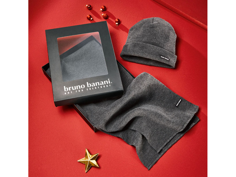 Eine graue Beanie und ein Schal von Bruno Banani in einer Geschenkbox.